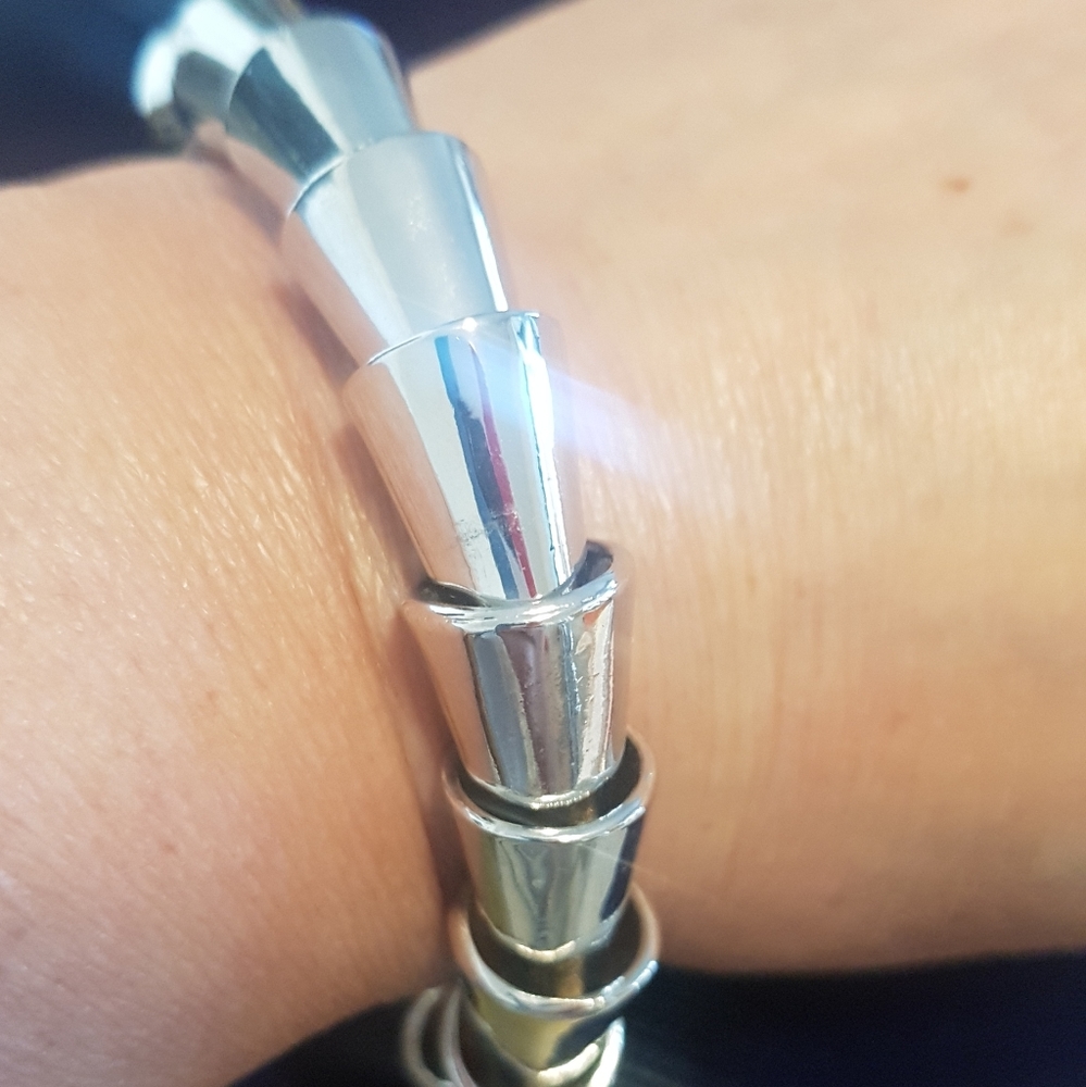 Gorgeous solid Silver- tone bracelet.